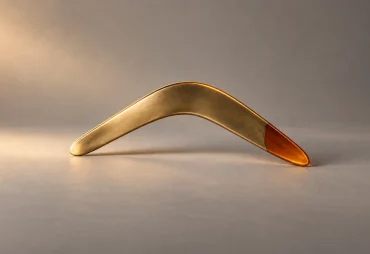 Brushed brass boomerang with an amber tip for remarketing explained