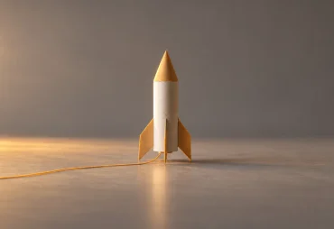 Minimalist paper rocket in warm light for a SaaS launch playbook